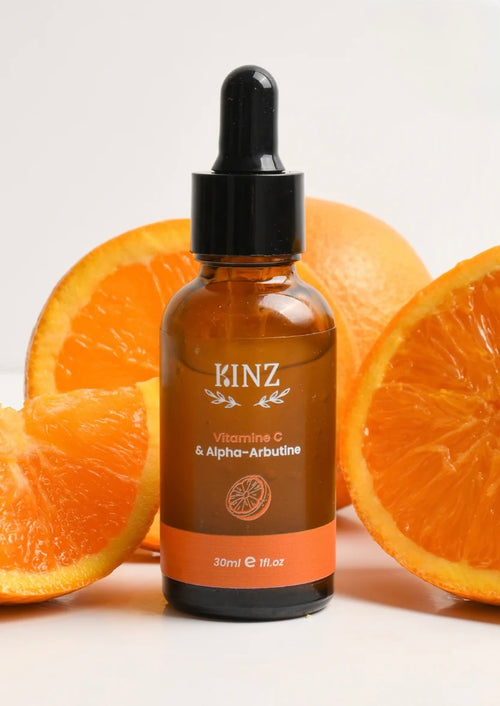 Bottle of Kinz anti-dark spot serum with vitamin C and alpha-arbutin, 30 ml