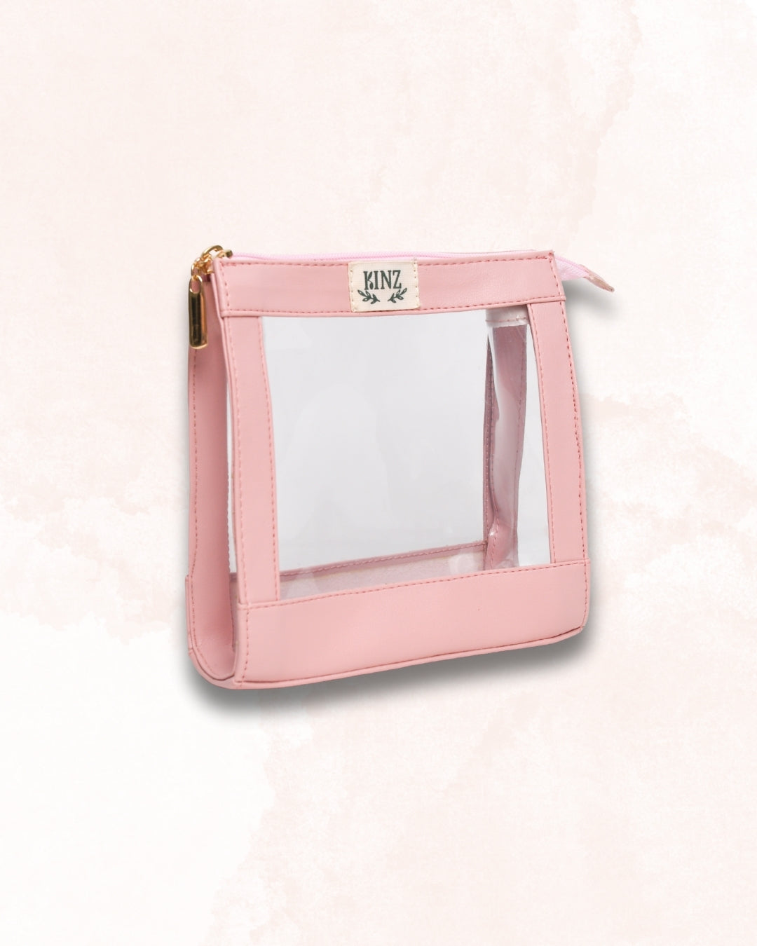 Trousse de beauté rose clair réutilisable signée Kinz, format voyage pour vos cosmétiques