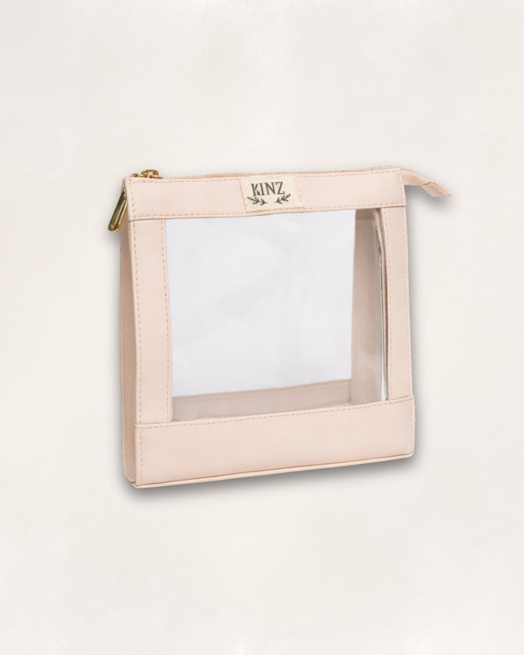 Trousse de beauté blanc cassé réutilisable signée Kinz, format voyage pour vos cosmétiques