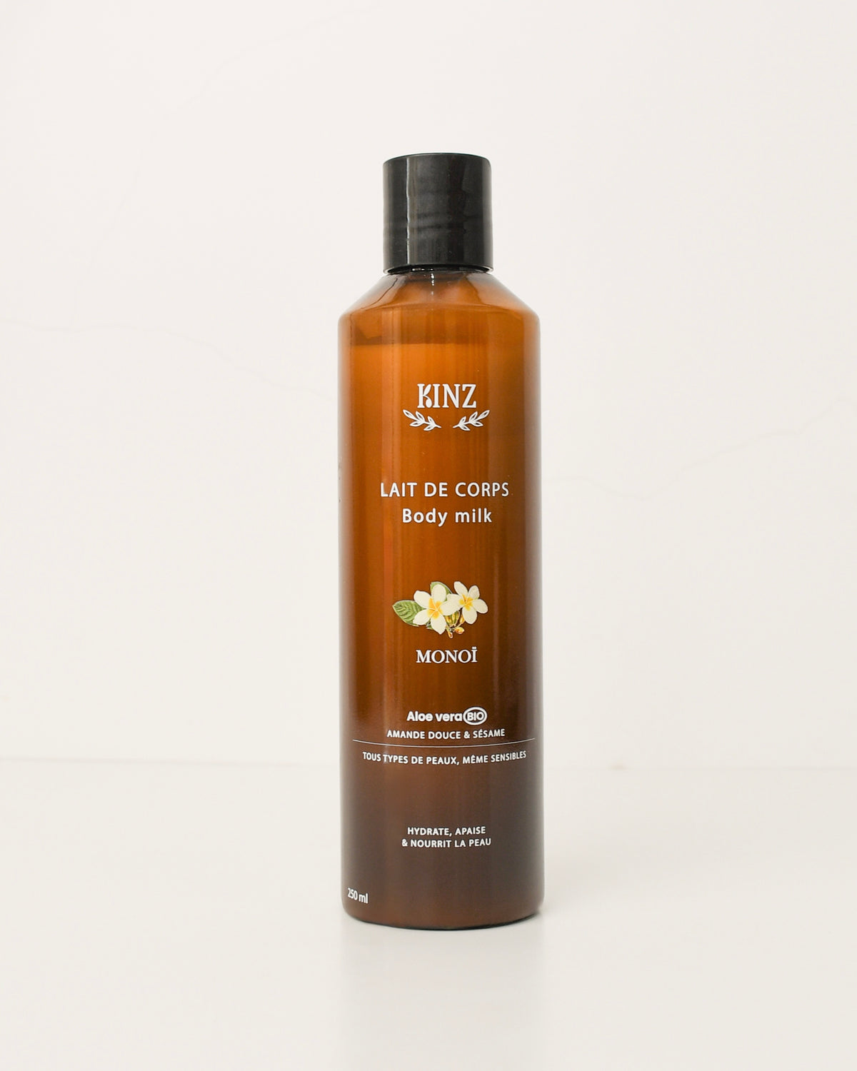 Lait de corps au monoï Kinz 250 ml, hydratation fondante et parfum solaire
