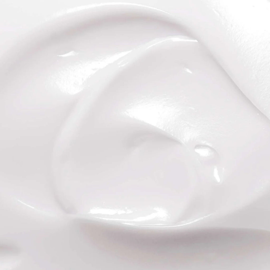 Flacon de lait de corps au monoï Kinz 250 ml, parfum solaire et texture non grasse