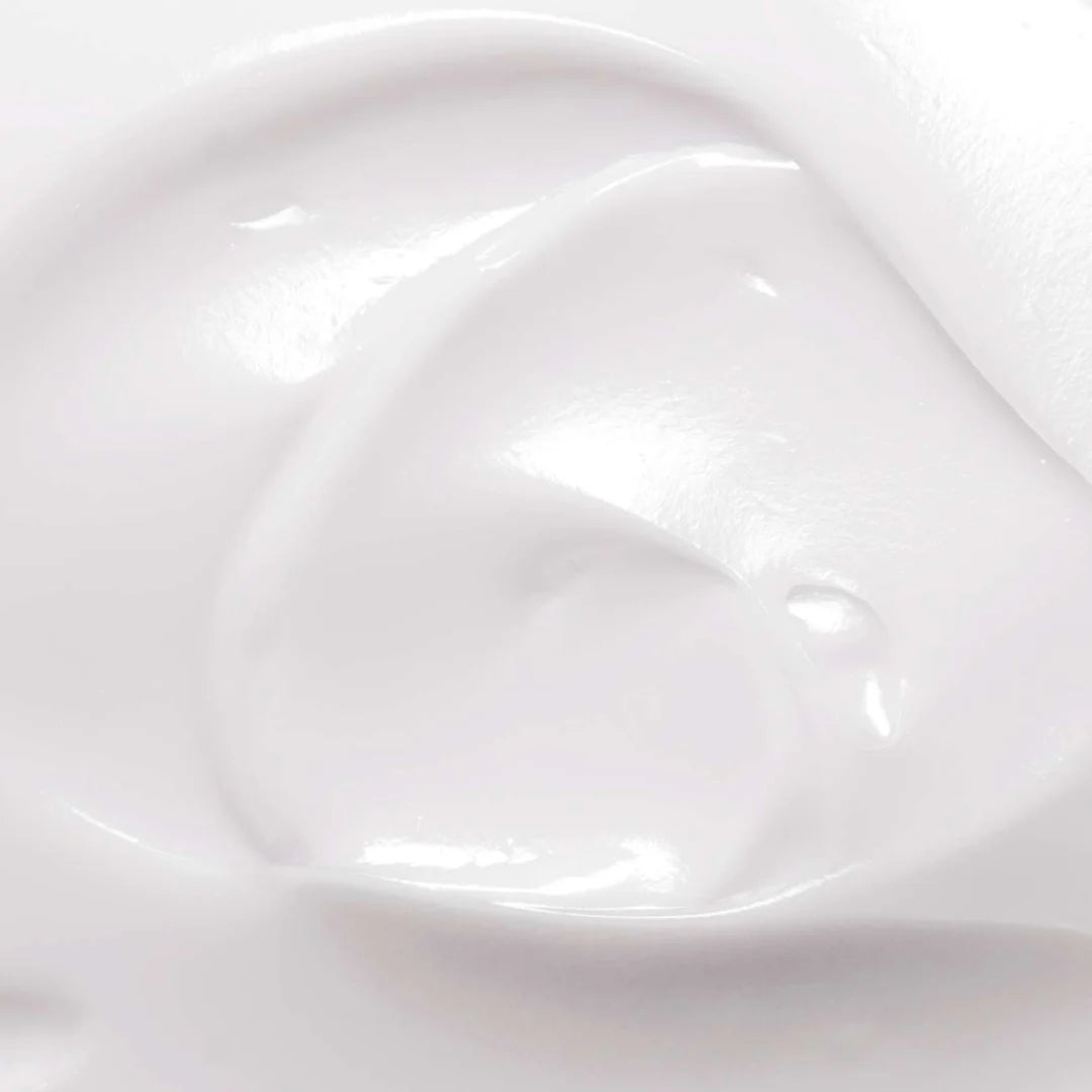 Flacon de lait de corps au monoï Kinz 250 ml, parfum solaire et texture non grasse