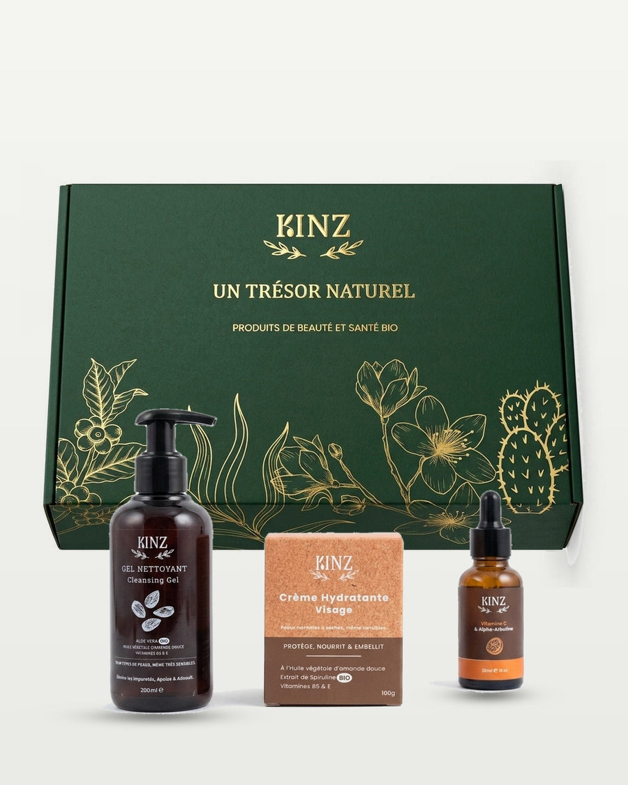 Pack Hydratation & Anti-taches Kinz devant son coffret vert : gel nettoyant, crème hydratante visage et sérum vitamine C